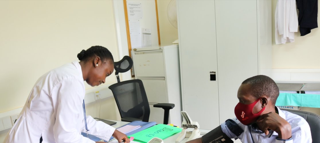 Clinician attending to a study participant